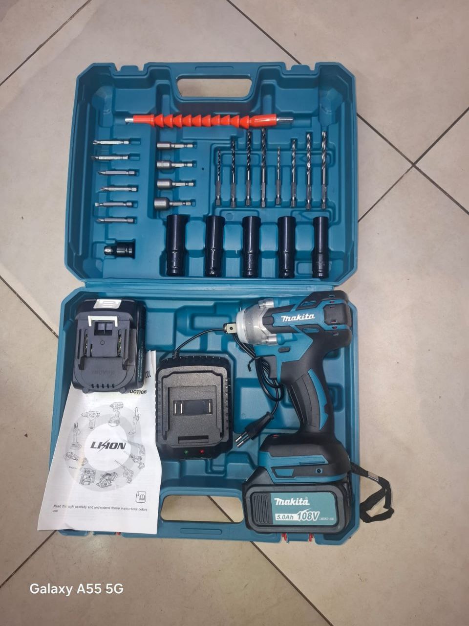 4fcf6a0a-5ee7-4428-b609-89bb8738fa2a Makita 108v cordless impact wrench - Image 1