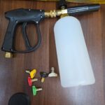 Pressure washer gun kit with a foam cannon and various nozzles